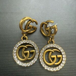 Brand new Gucci Gold tone Crystal Logo Drop Earrings